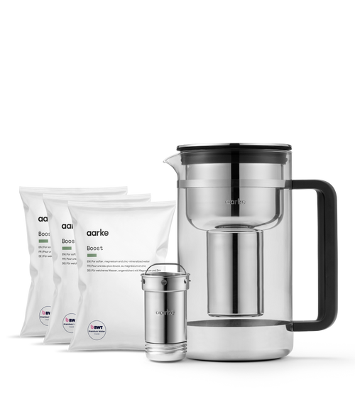 Aarke Water Purifier Large with three Boost Filter Granules refill bags for softer, magnesium- and zinc-mineralized water.